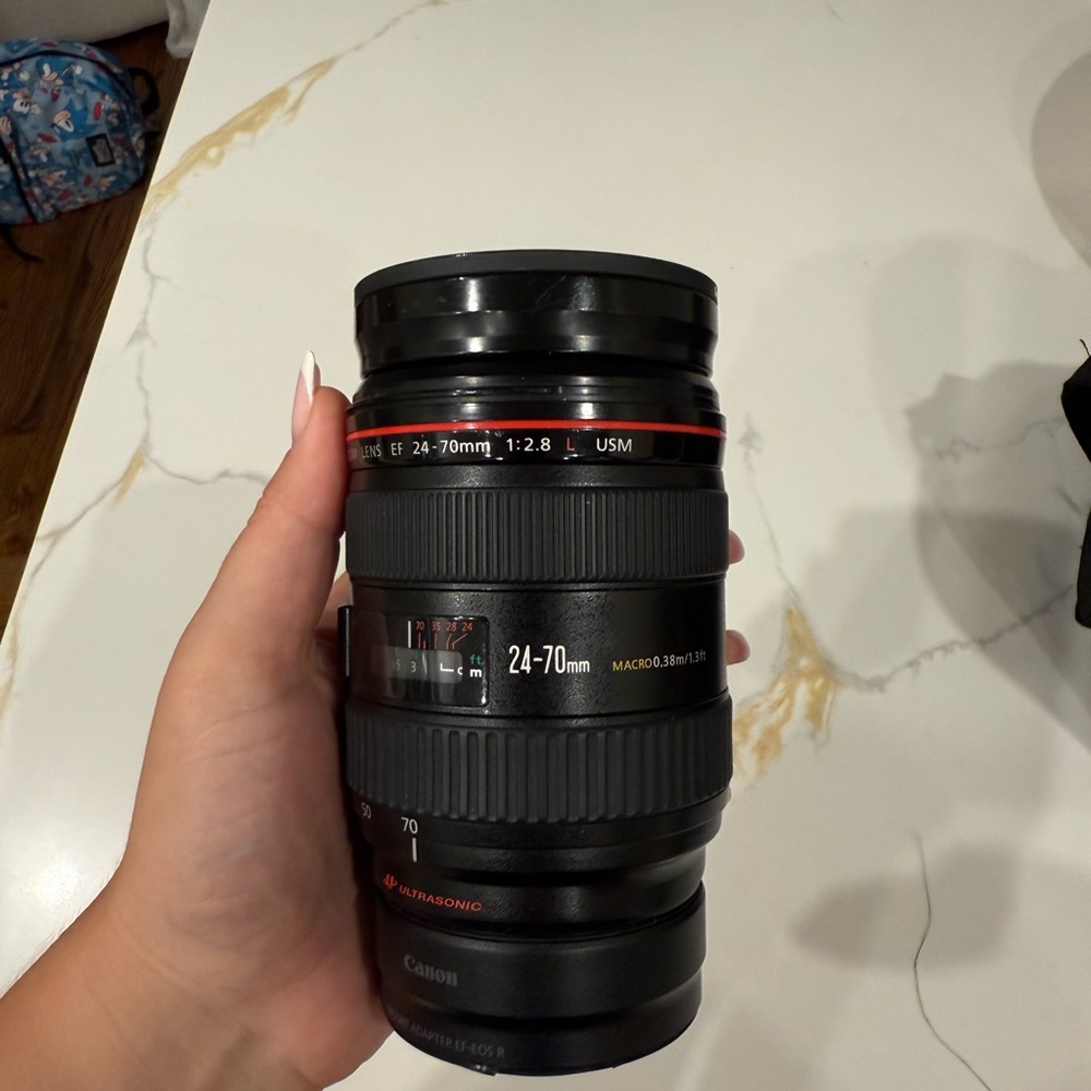 Canon Black and Red Camera Lens